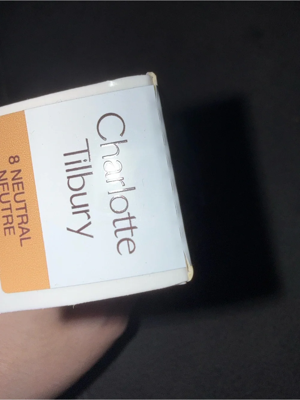 Charlotte Tilbury Neutral Shade 8 Packaging - White and Tan